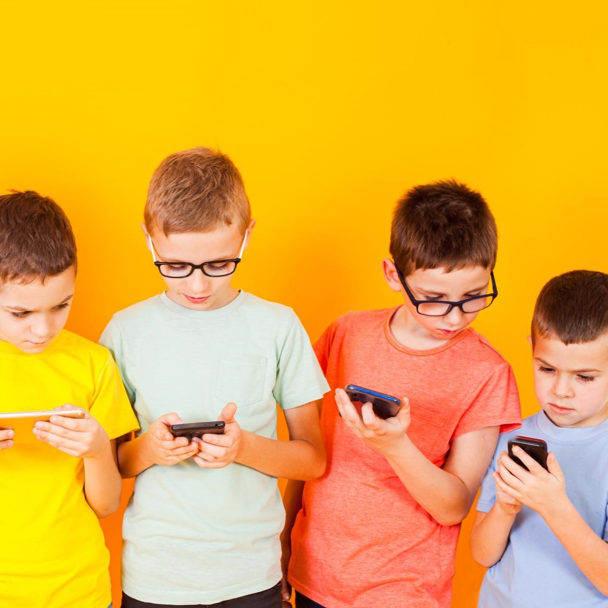 group-kids-using-digital-mobile-phone-yellow.jpg
